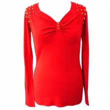 Pull chic avec épaules cloutées