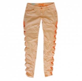 Pantalon rose orange paré de nœuds côtés