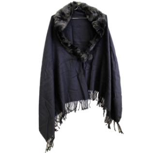 Poncho femme bordé de franges avec col fourré